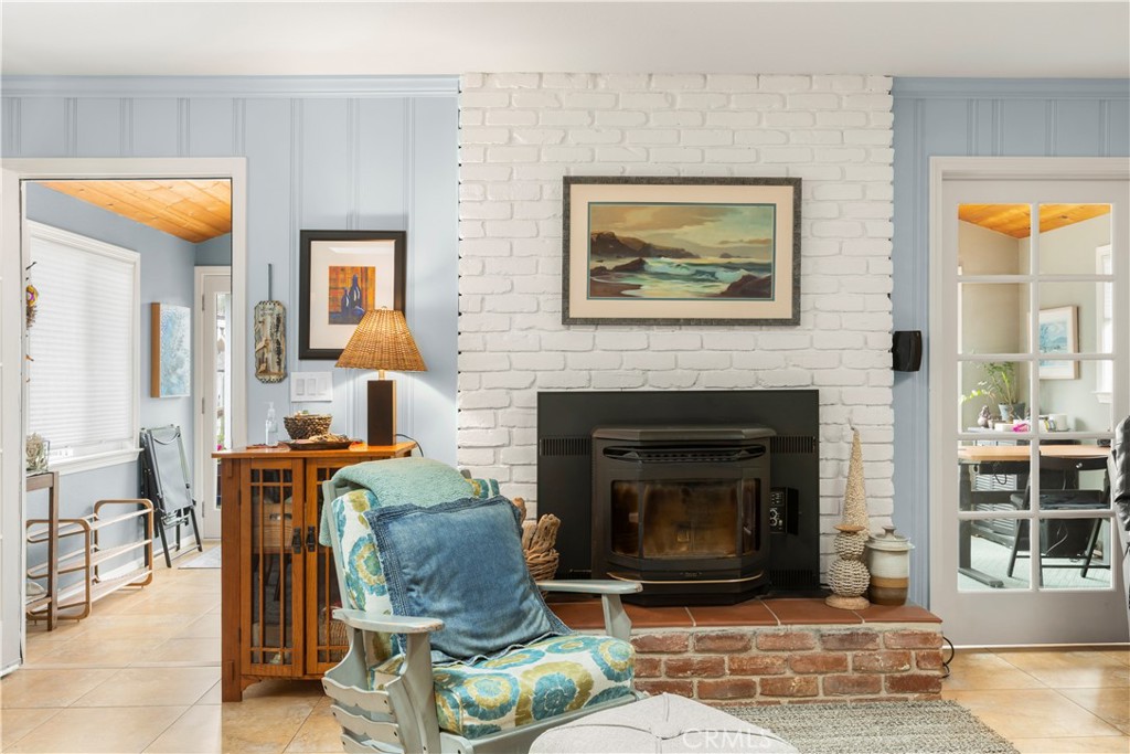 50 5th Street Cayucos, CA 93430 - Photo 28 of 47 a living room with furniture and a fireplace