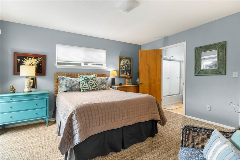 50 5th Street Cayucos, CA 93430 - Photo 32 of 47 a bedroom with a bed and a window