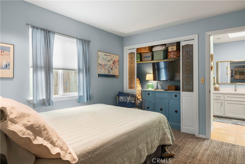 50 5th Street Cayucos, CA 93430 - Photo 34 of 47 a bedroom with a bed and a large window