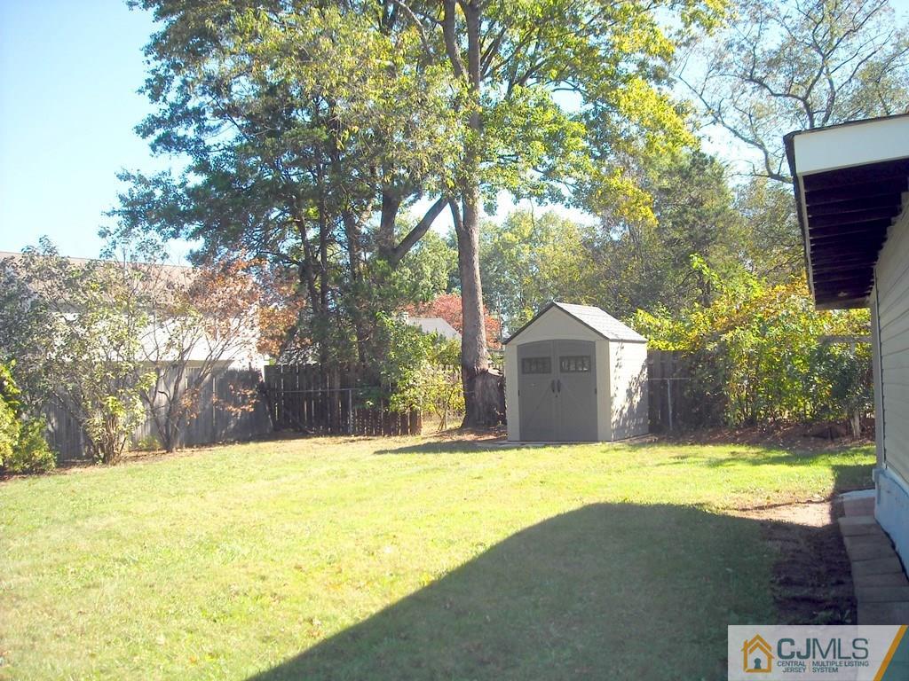 31 Markham Road Edison, NJ 08817 - Photo 2 of 13 a view of a house with a yard