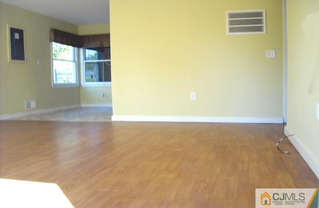 31 Markham Road Edison, NJ 08817 - Photo 4 of 13 a view of an empty room