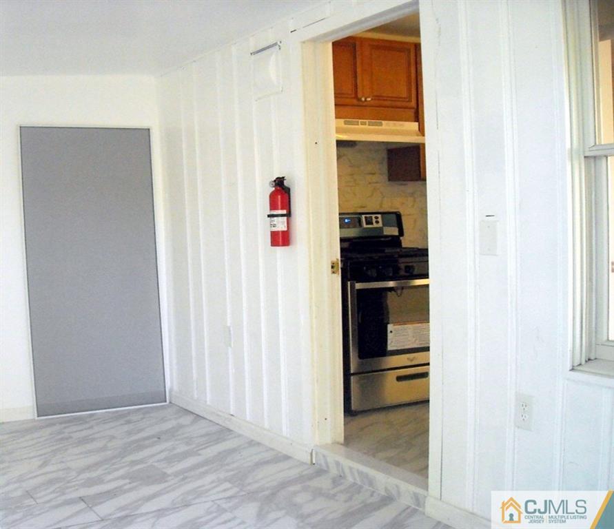 31 Markham Road Edison, NJ 08817 - Photo 8 of 13 a view of an entryway and livingroom