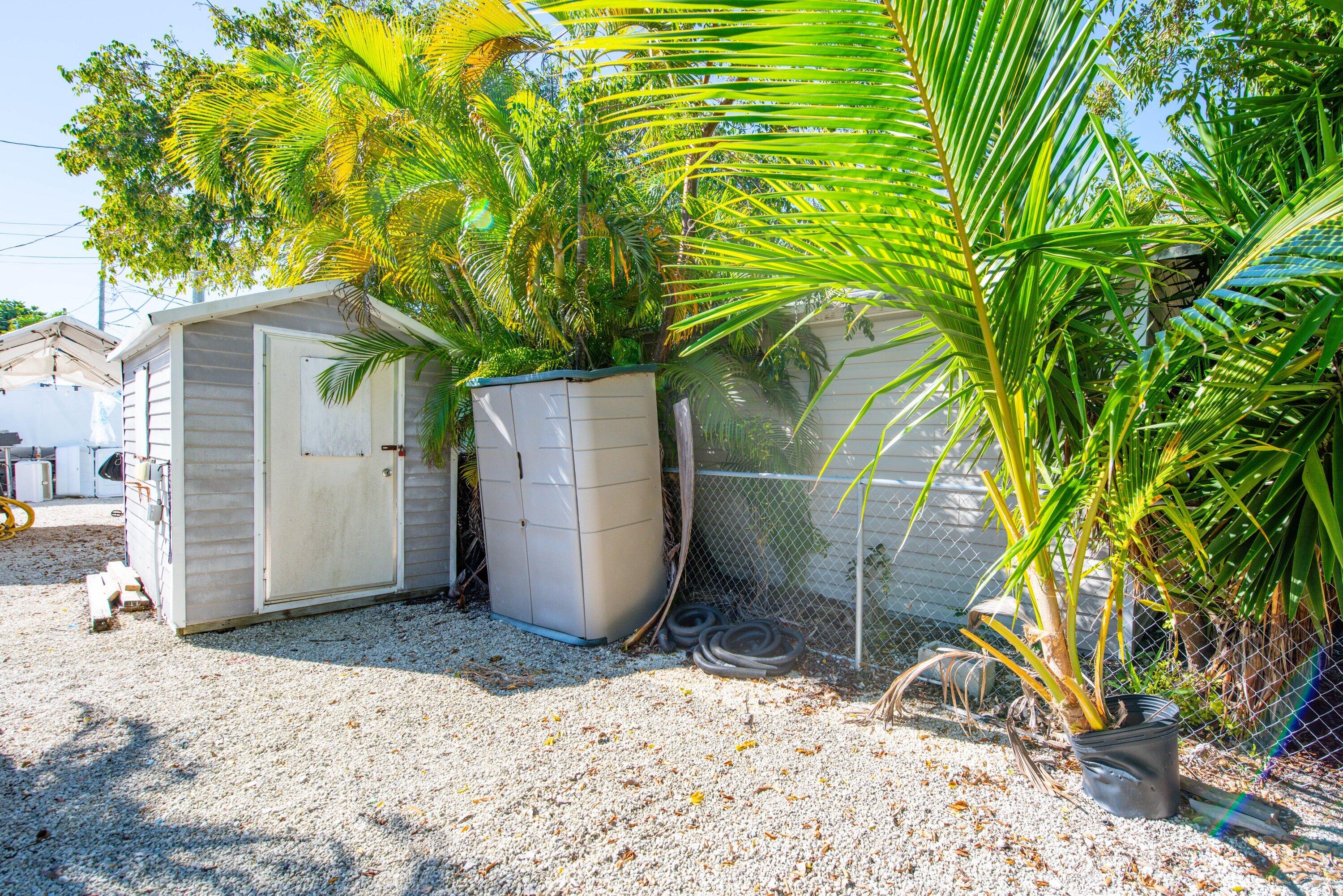138 Sands Road Big Pine Key, FL 33043 - Photo 14 of 18 a view of a backyard of the house