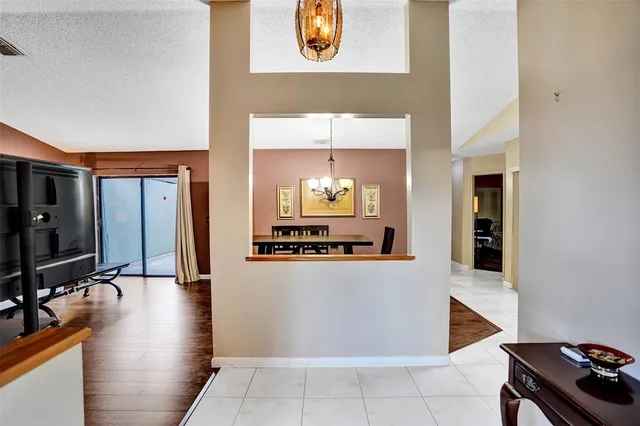 a dinning room with a table and chairs