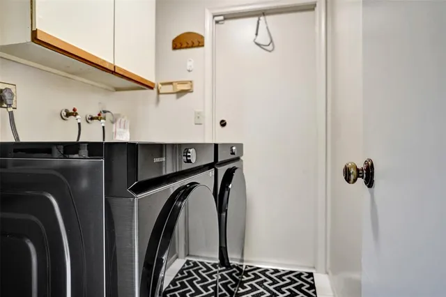 an aerial view of a house with a garden and trees
