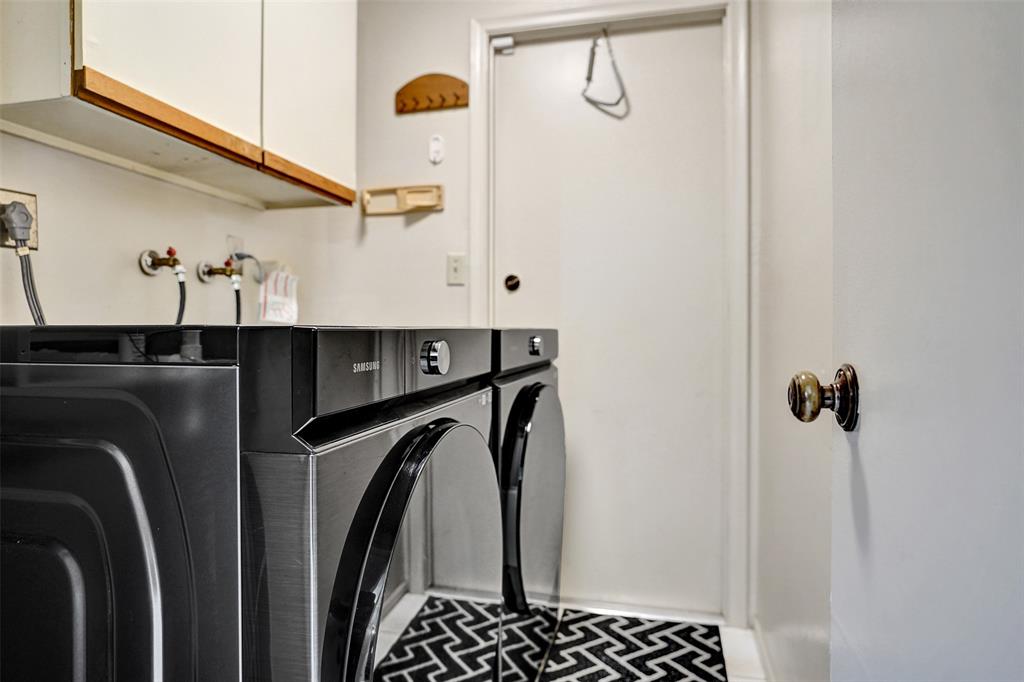 9132 Southwest 20th Street, Unit B Boca Raton, FL 33428 - Photo 45 of 81 a close view of a sink and dryer