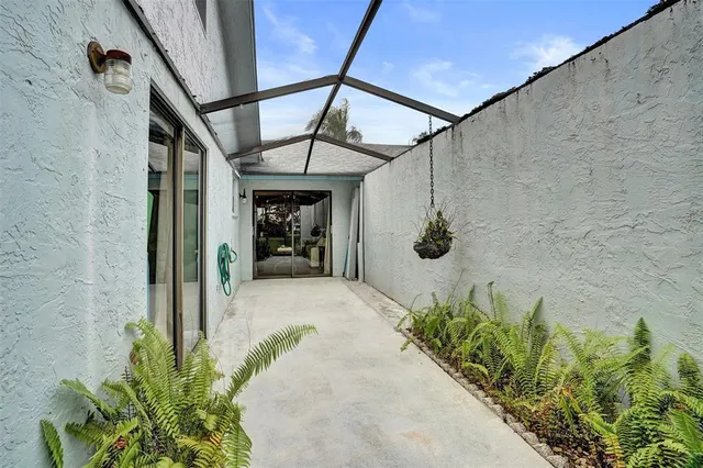 an aerial view of multiple houses with yard