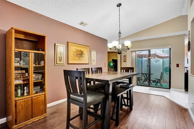 a view of a dining room with furniture