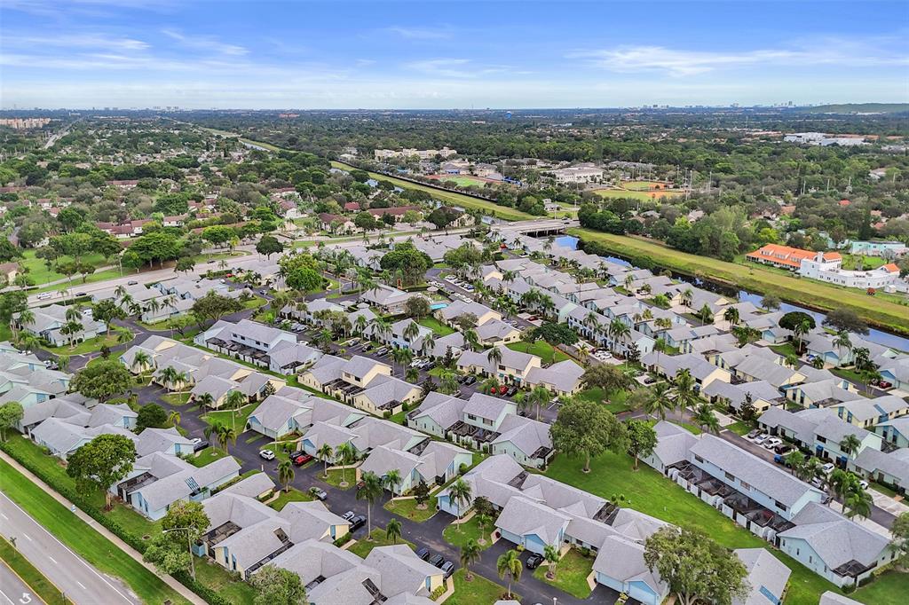 9132 Southwest 20th Street, Unit B Boca Raton, FL 33428 - Photo 76 of 81 an aerial view of a city with lots of residential buildings