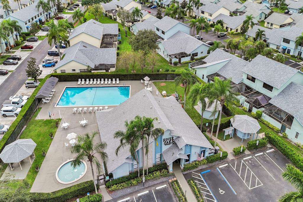 9132 Southwest 20th Street, Unit B Boca Raton, FL 33428 - Photo 80 of 81 an aerial view of multiple houses with yard