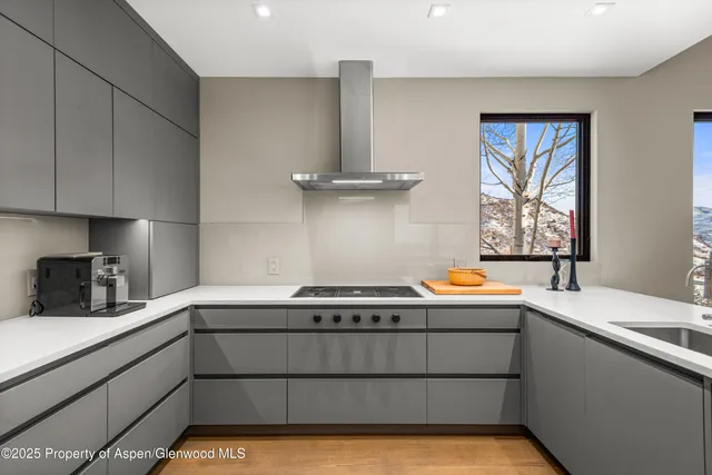 a view of a kitchen with a sink cabinets and window