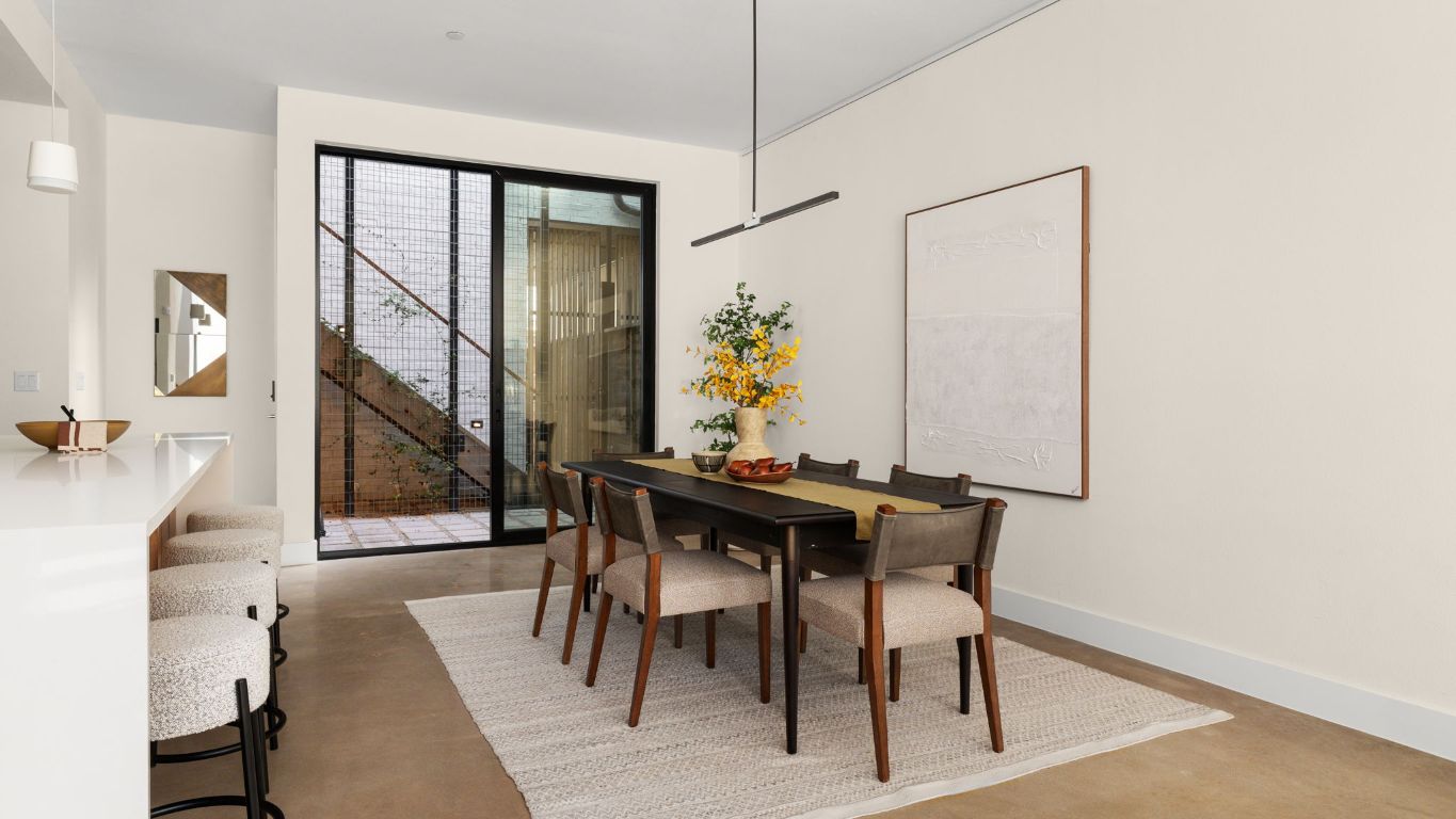 3813 Tilley Street Austin, TX 78723 - Photo 11 of 26 a view of a dining room with furniture and wooden floor