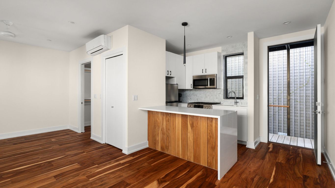 3813 Tilley Street Austin, TX 78723 - Photo 19 of 26 a kitchen with stainless steel appliances a refrigerator and a stove top oven