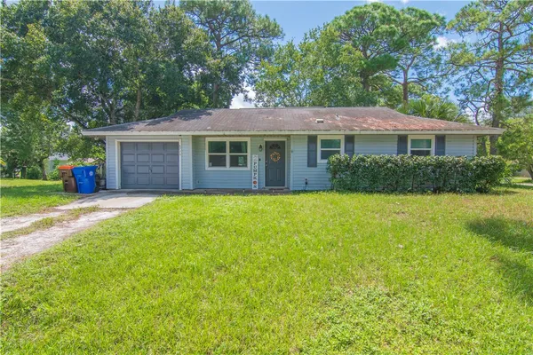 front view of a house with a yard