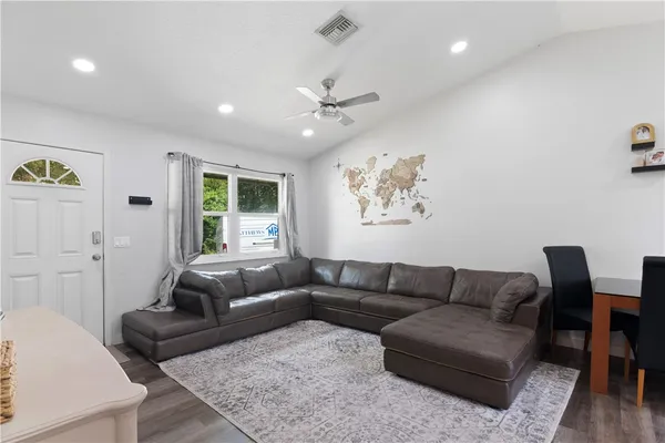 a living room with furniture and a couch