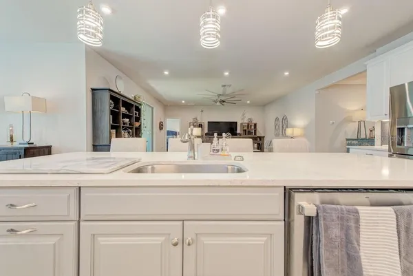 a bedroom with a bed and flat screen tv