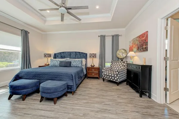 a bathroom with a double vanity sink a toilet and a mirror