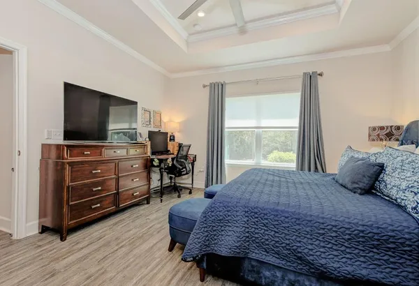 a bathroom with a sink vanity and mirror