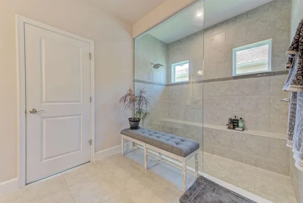 an aerial view of a house with a garden and plants