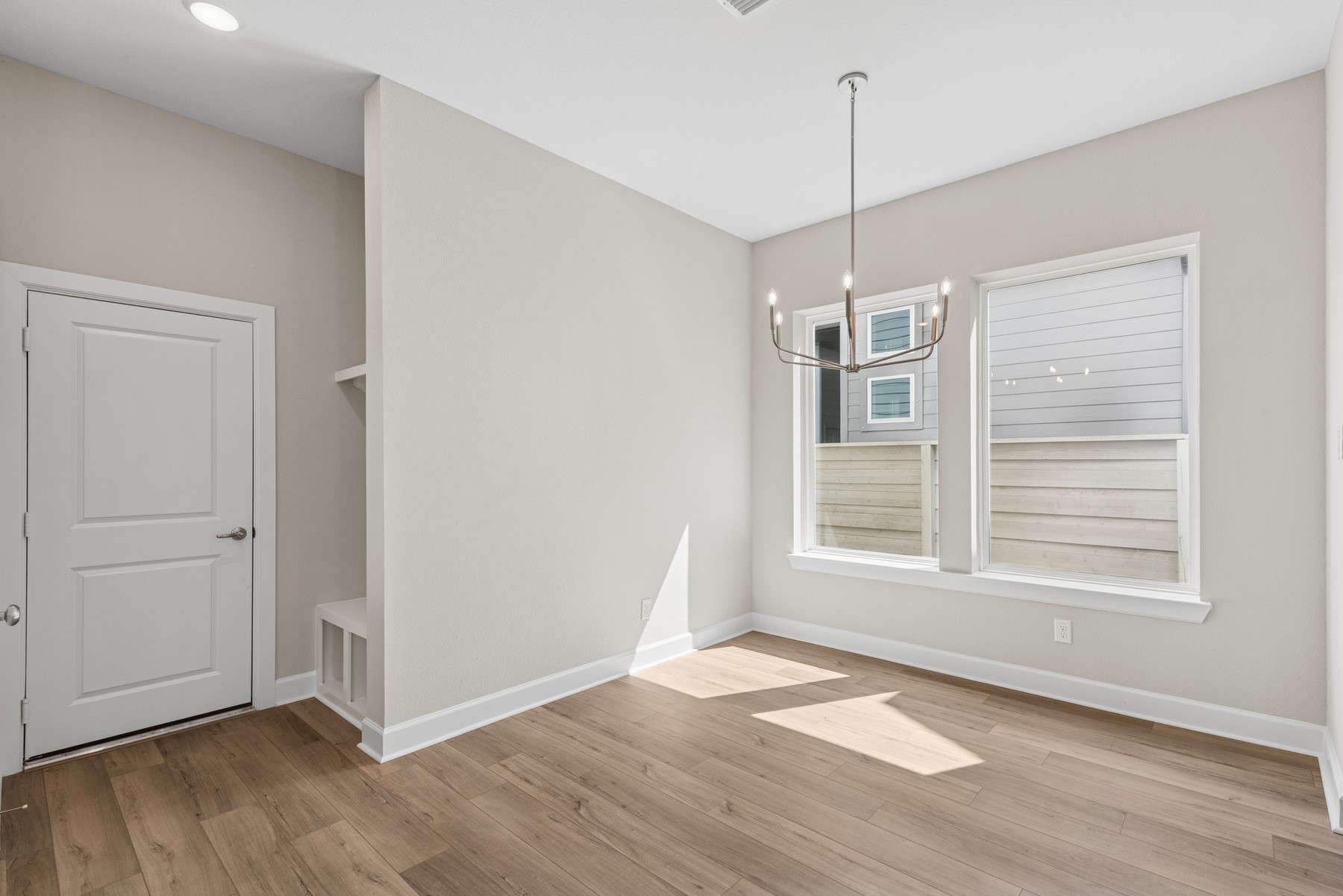 5515 Orangery Lane Manvel, TX 77578 - Photo 24 of 48 a view of empty room with wooden floor and fan