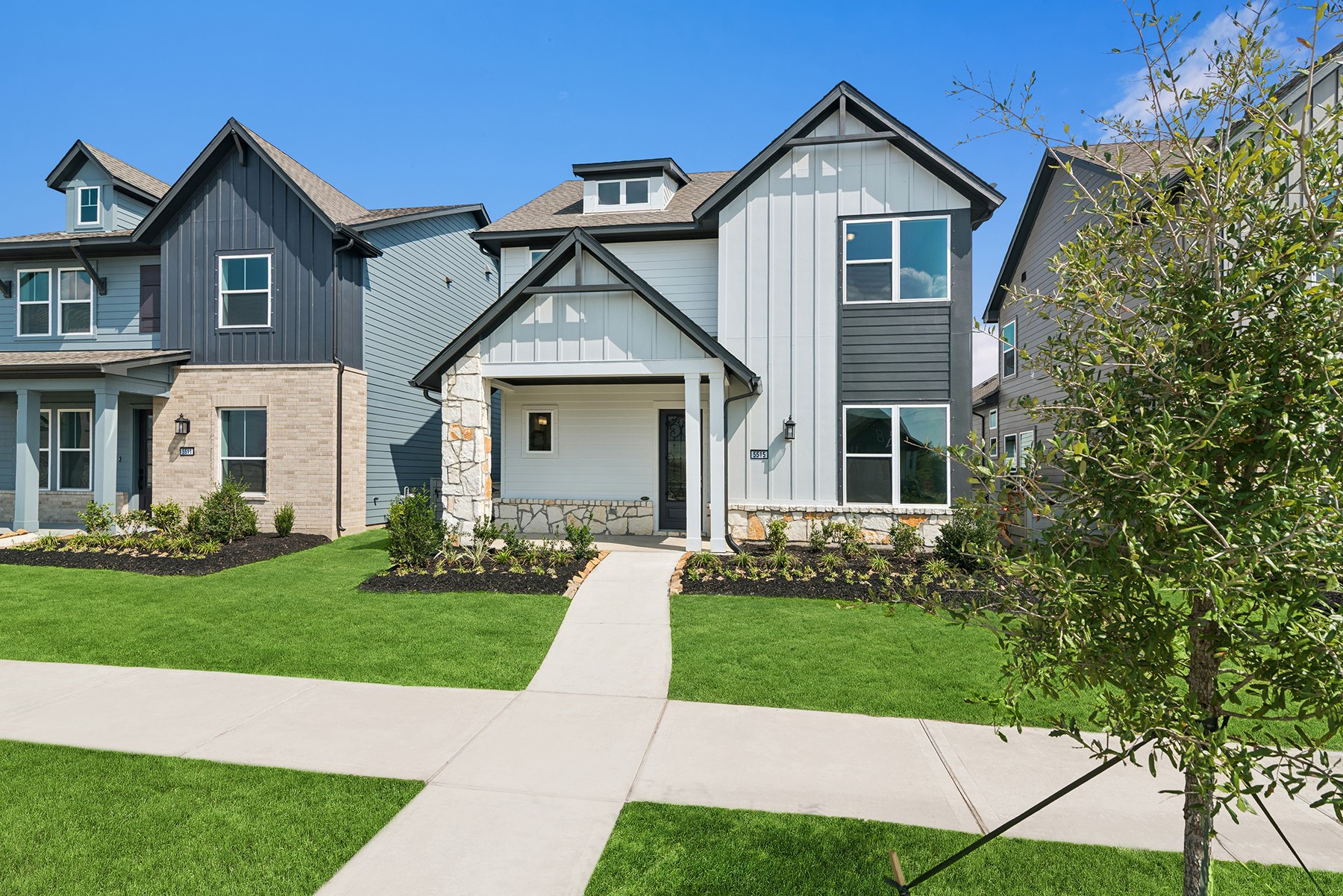 5515 Orangery Lane Manvel, TX 77578 - Photo 3 of 48 a front view of a house with a yard