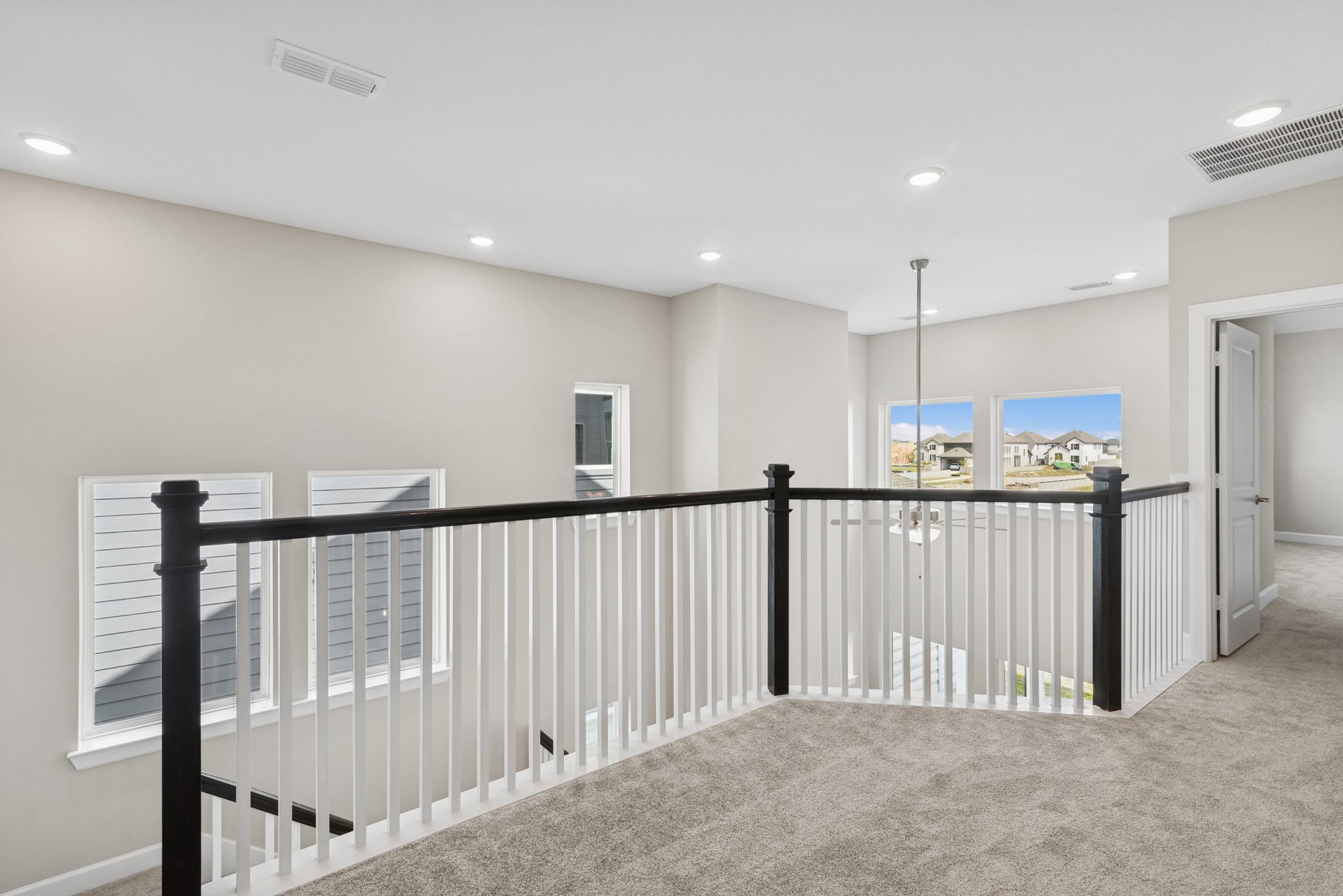 5515 Orangery Lane Manvel, TX 77578 - Photo 30 of 48 a view of a hallway with kitchen