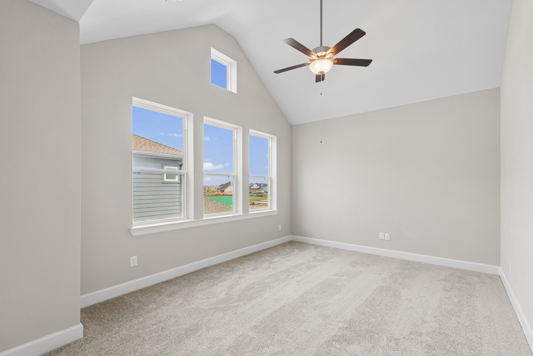 5515 Orangery Lane Manvel, TX 77578 - Photo 36 of 48 an empty room with windows and fan