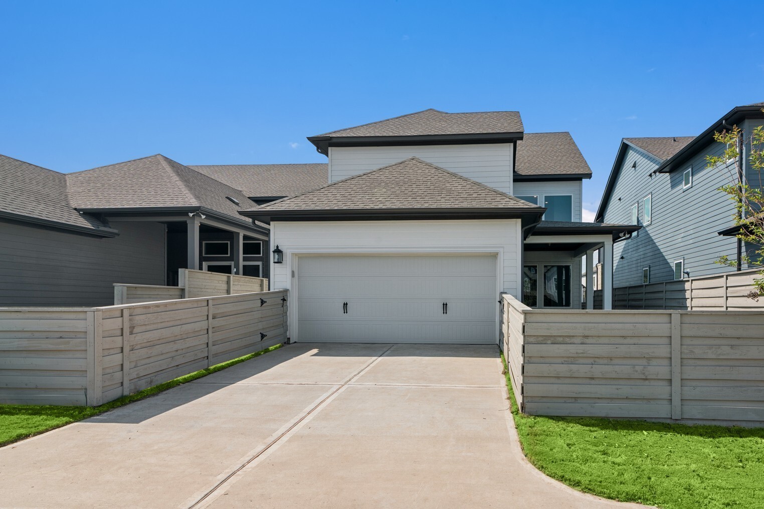 5515 Orangery Lane Manvel, TX 77578 - Photo 8 of 48 a front view of a house with a garage