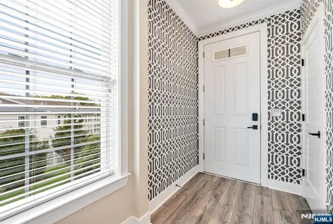 a view of a room with windows