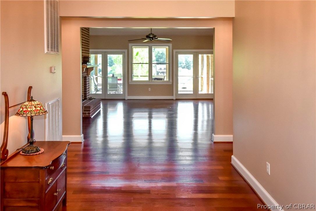 1789 Western Branch Road Lancaster, VA 22503 - Photo 2 of 33 FOYER LOOKING INTO LIVING ROOM