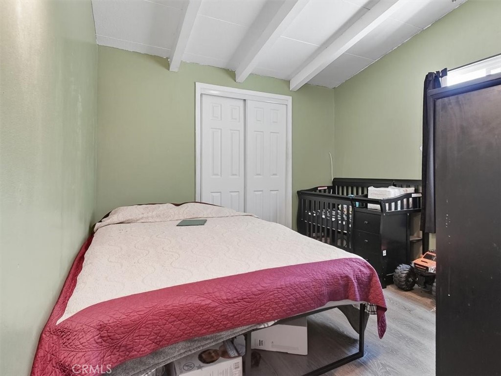 1407 Colonial Avenue Anaheim, CA 92802 - Photo 24 of 33 a bedroom with a bed and a closet