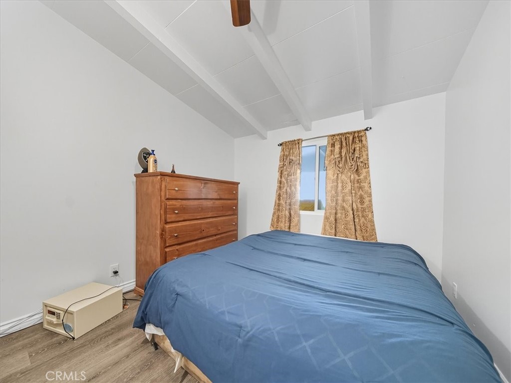 1407 Colonial Avenue Anaheim, CA 92802 - Photo 25 of 33 a bedroom with a bed and window