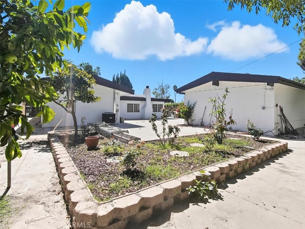 1407 Colonial Avenue Anaheim, CA 92802 - Photo 28 of 33 a view of a house with backyard
