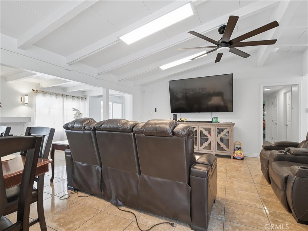 1407 Colonial Avenue Anaheim, CA 92802 - Photo 6 of 33 a living room with furniture and a flat screen tv