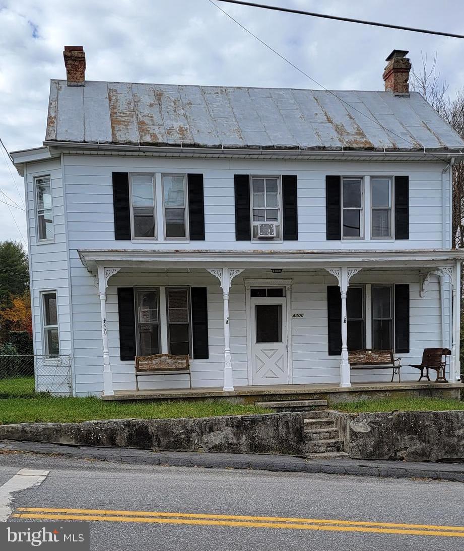 4300 Main Street Rohrersville, MD 21779 - Photo 1 of 19 a front view of a house with a yard