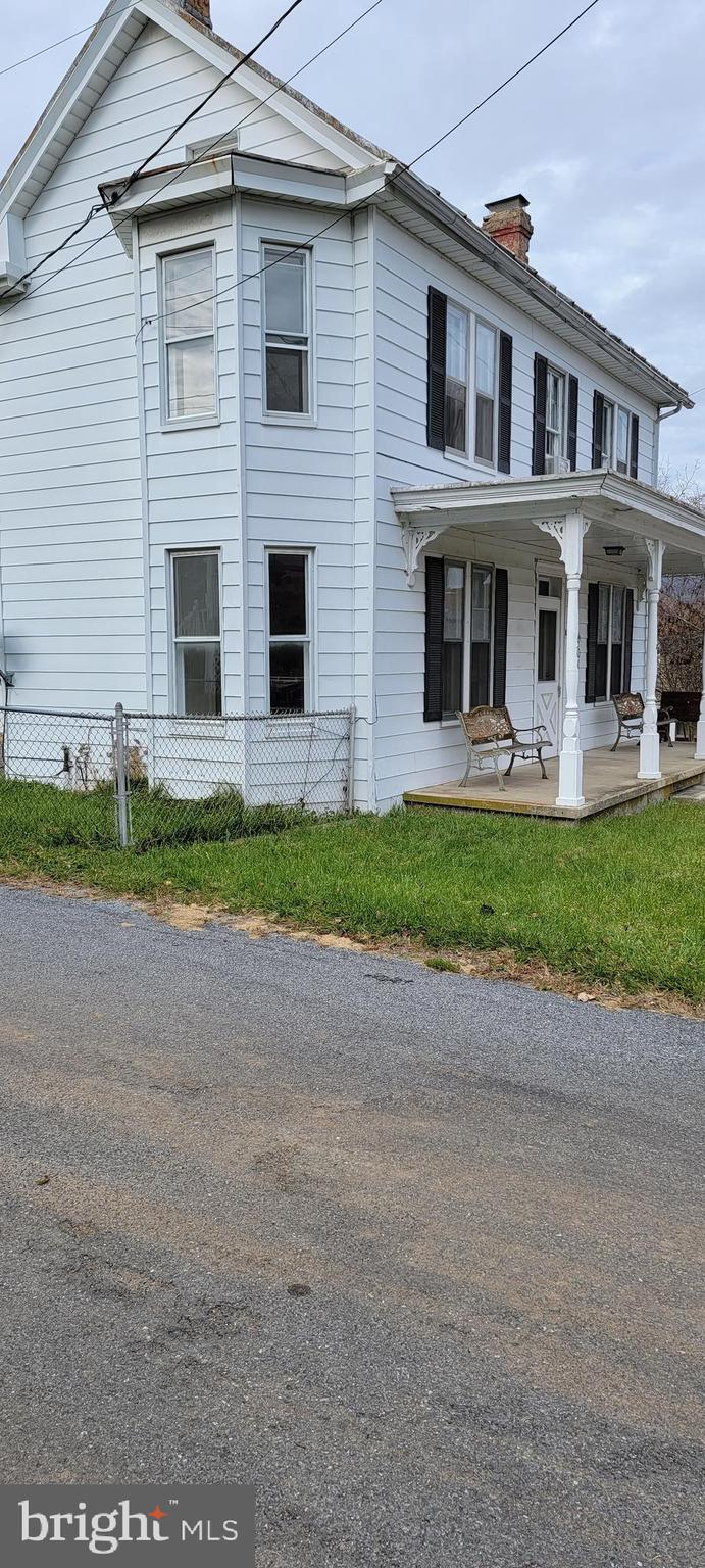 4300 Main Street Rohrersville, MD 21779 - Photo 2 of 19 a front view of house with yard and green space