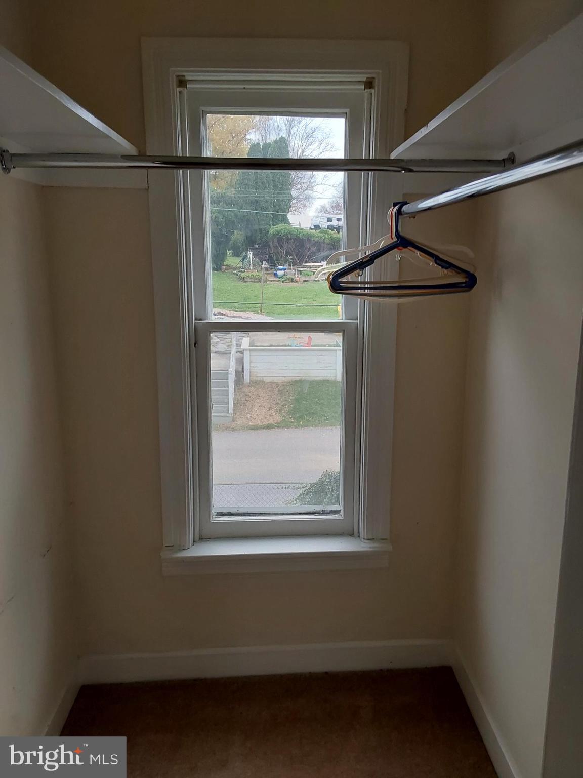 4300 Main Street Rohrersville, MD 21779 - Photo 13 of 19 a view of a small space with wooden floor and a window