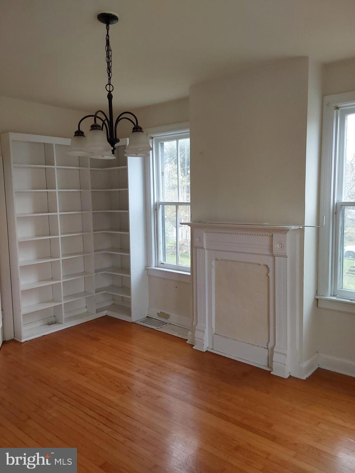 4300 Main Street Rohrersville, MD 21779 - Photo 4 of 19 a view of empty room with wooden floor and fan