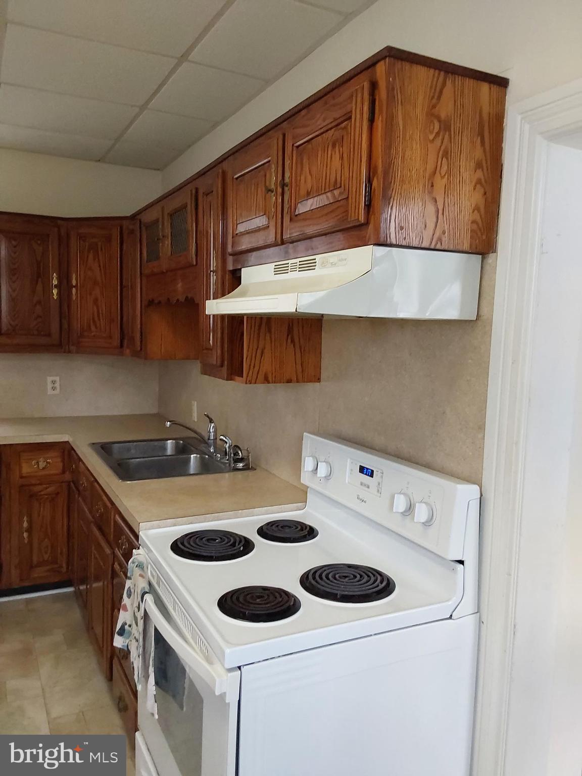 4300 Main Street Rohrersville, MD 21779 - Photo 7 of 19 a kitchen with a stove and a microwave
