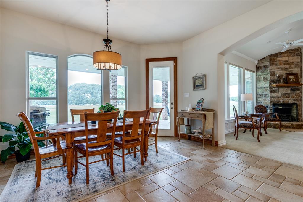 12198 Bell Road Pilot Point, TX 76258 - Photo 11 of 40 The eat-in kitchen offers gorgeous outdoor views.