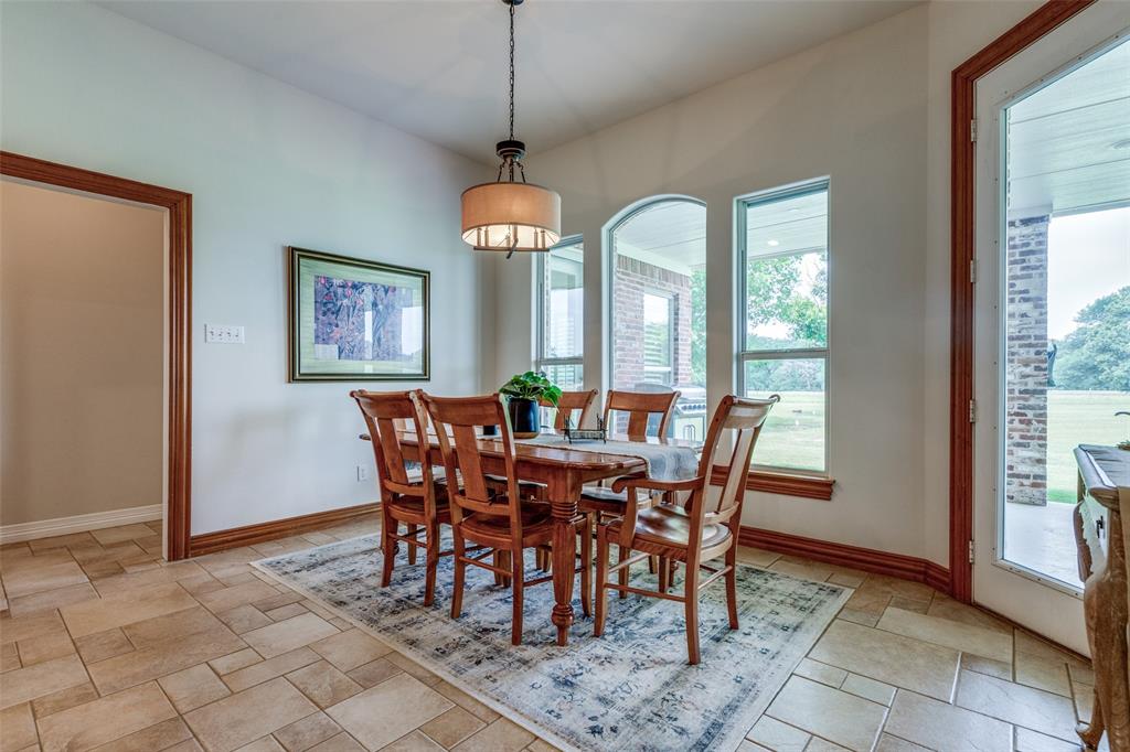 12198 Bell Road Pilot Point, TX 76258 - Photo 12 of 40 The dining area is conveniently located off kitchen and living room.