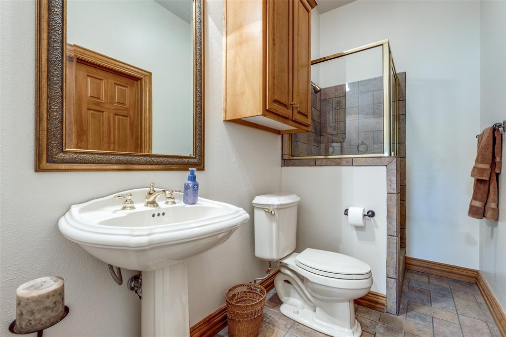 12198 Bell Road Pilot Point, TX 76258 - Photo 15 of 40 The hall bathroom also has office/study access.