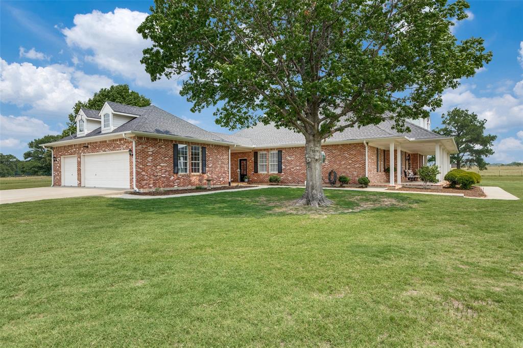 12198 Bell Road Pilot Point, TX 76258 - Photo 25 of 40 Plenty of parking and 3-car garage