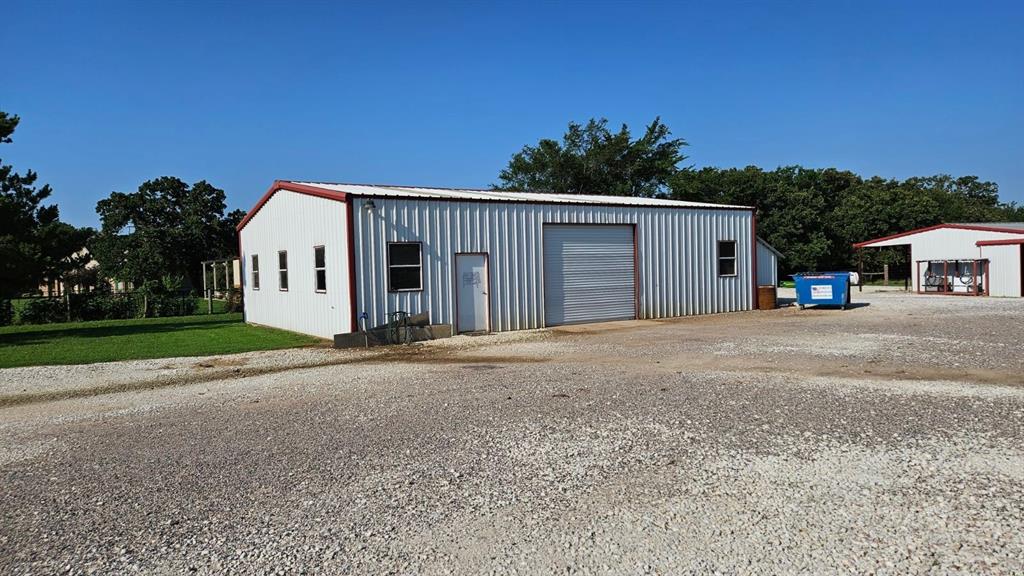 12198 Bell Road Pilot Point, TX 76258 - Photo 31 of 40 View of 3 outbuildings, 2 of which are equipped with electricity & water.