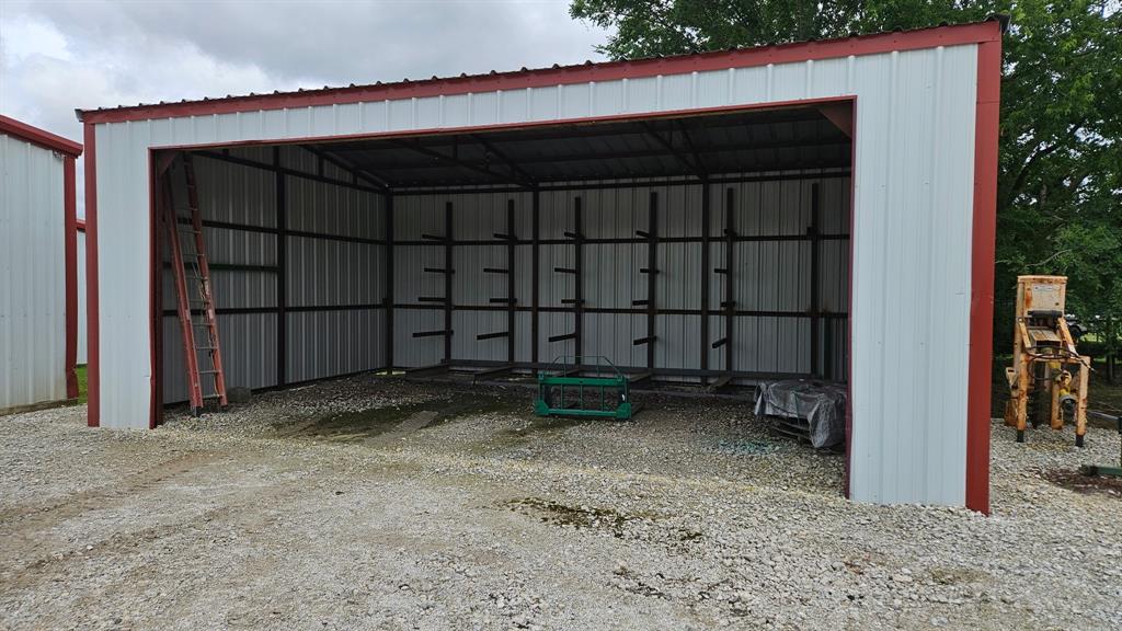 12198 Bell Road Pilot Point, TX 76258 - Photo 33 of 40 Additional open-sided, 600 sqft hay/equipment storage building