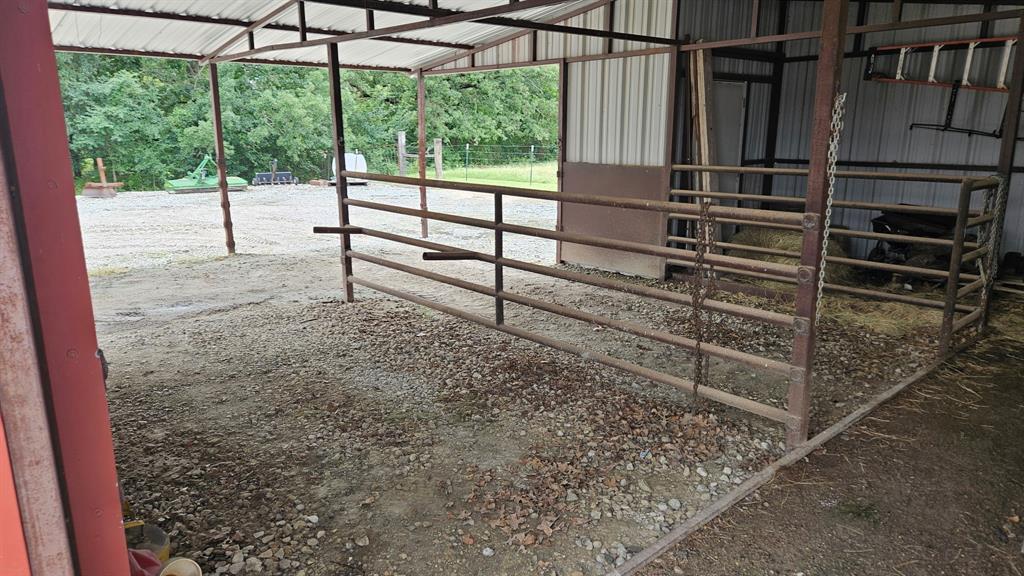 12198 Bell Road Pilot Point, TX 76258 - Photo 34 of 40 Livestock facility (705 sqft) is equipped with electricity and water.