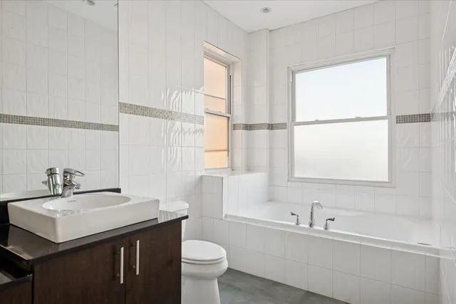 a bathroom with a sink and a bathtub