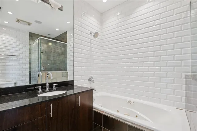 a bathroom with a sink and a bathtub