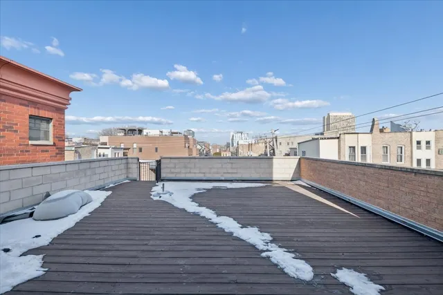 a view of a terrace with wooden floor