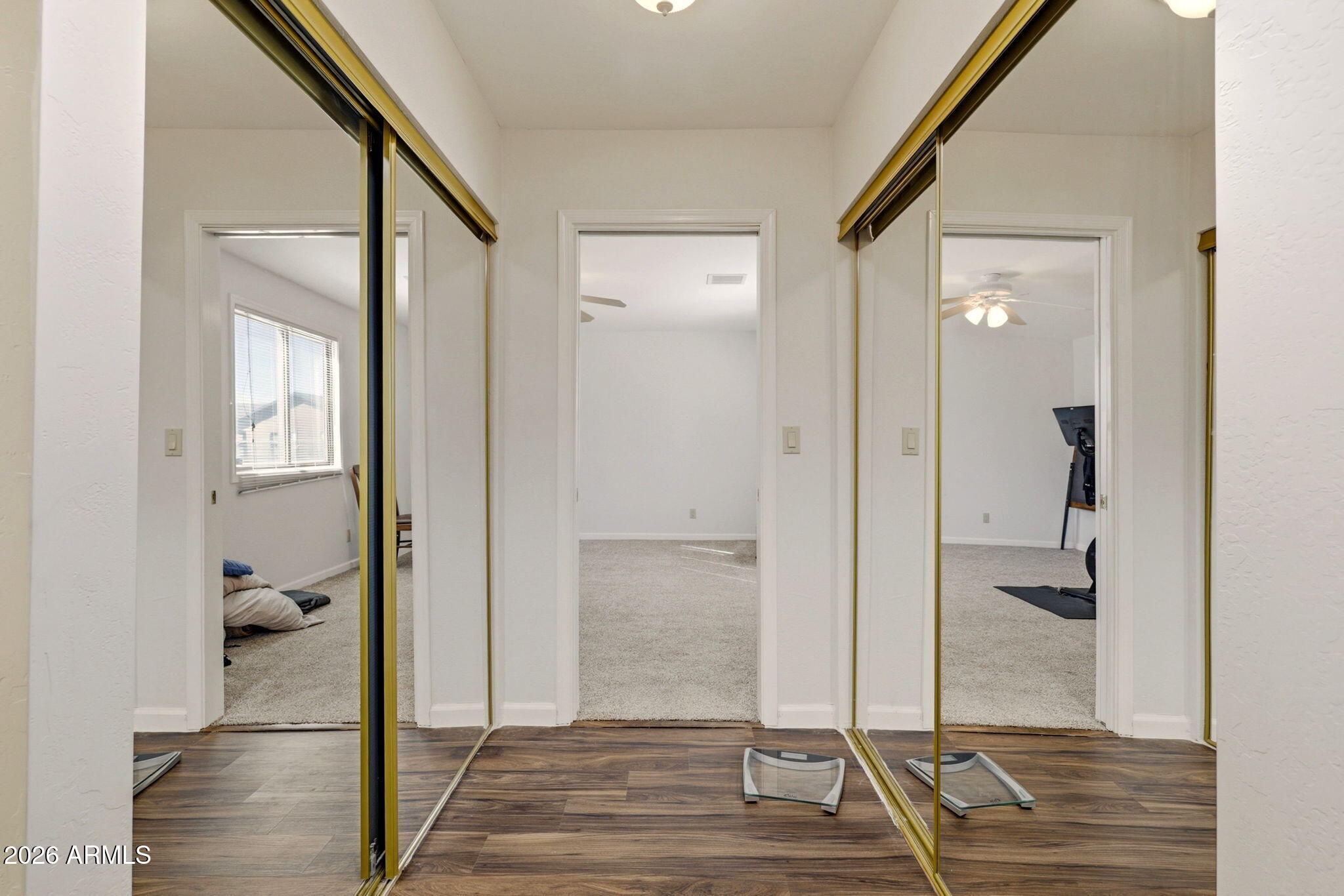 2746 Pineview Court Overgaard, AZ 85933 - Photo 20 of 30 a view of a hallway with wooden floor and a bathroom